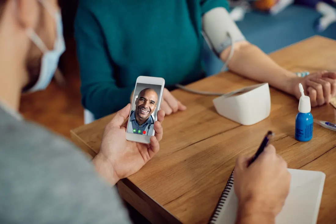 Logging a blood-pressure reading in a phone app.