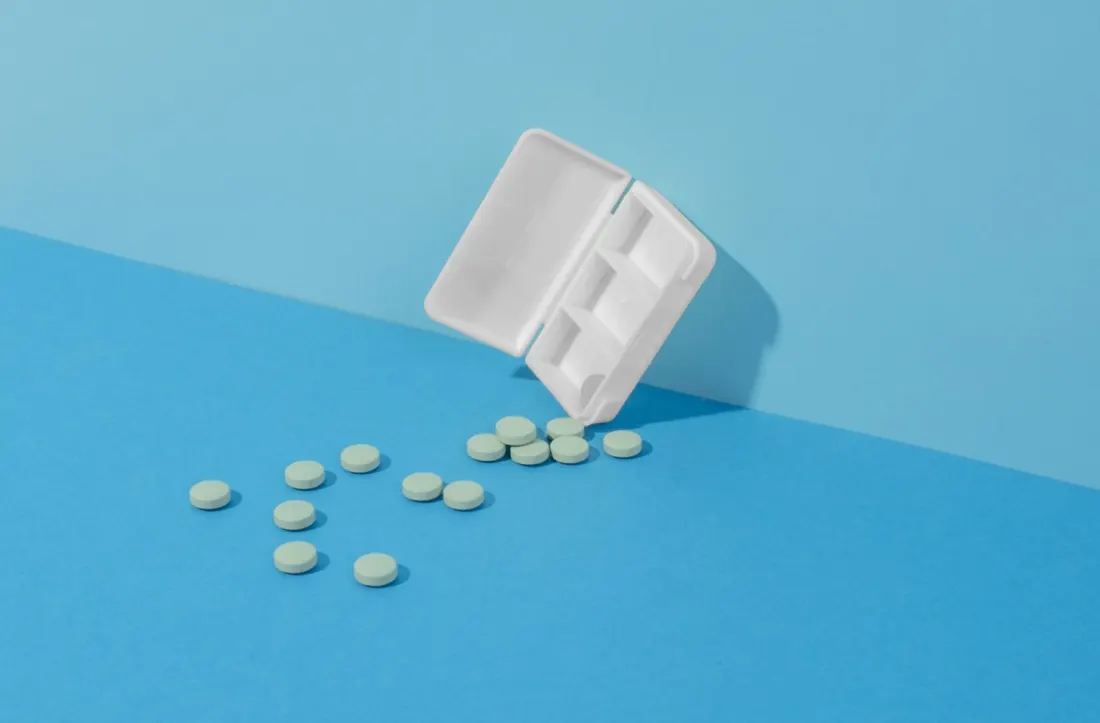 Medication packaging on a counter.