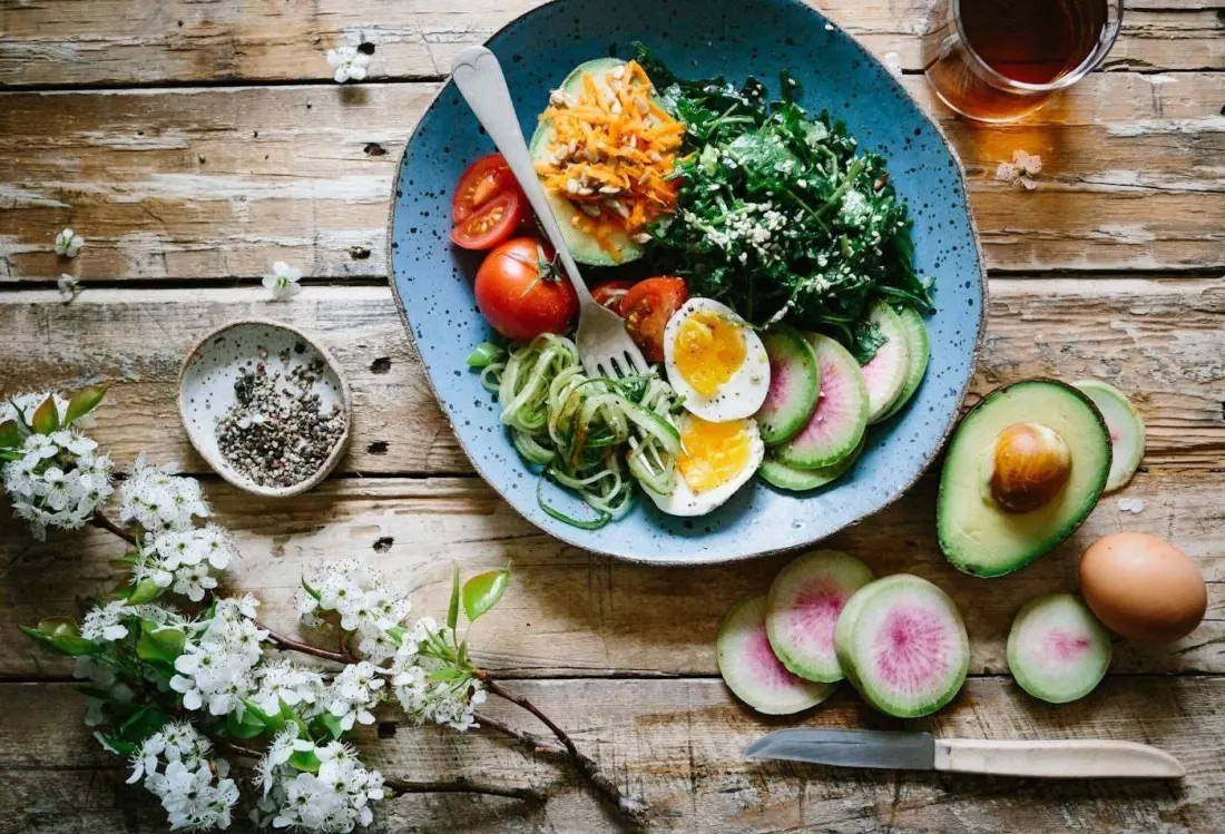 Protein-forward meal bowls on a table.